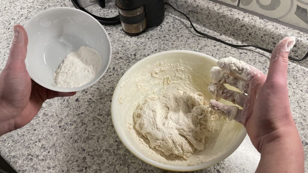 mixing pizza dough